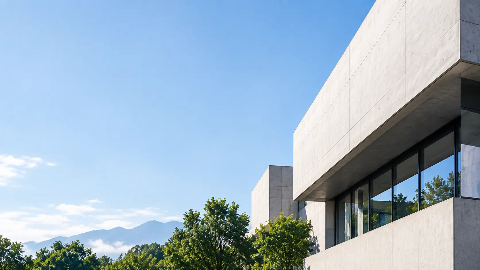 Modern concrete building against a clear sky